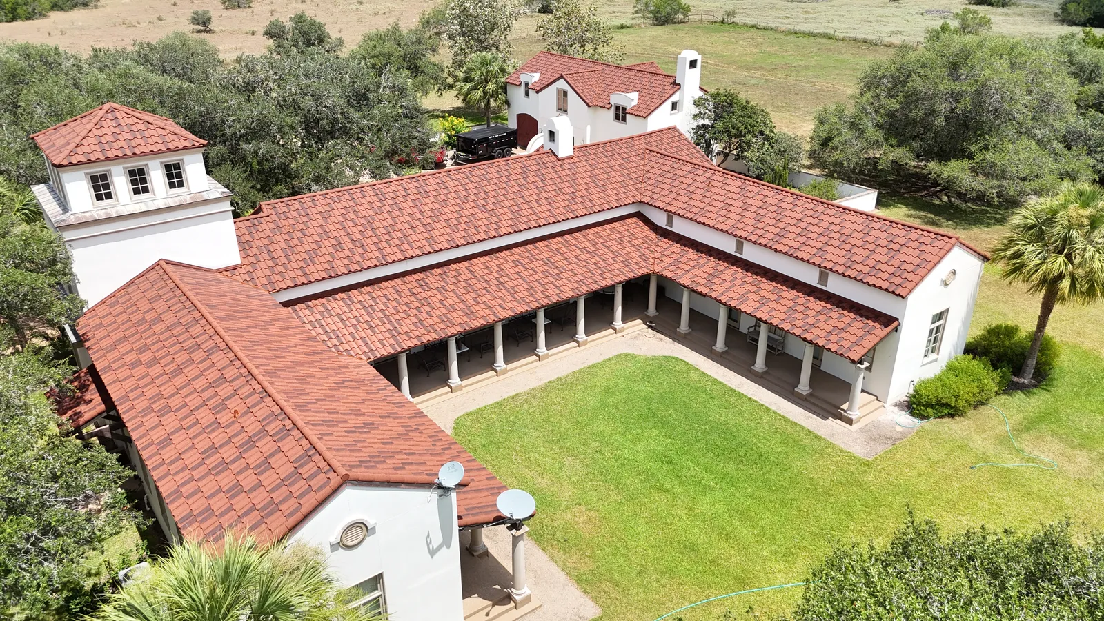 Stone coated steel DECRA roof by RISE Roofing Austin — aerial view 3